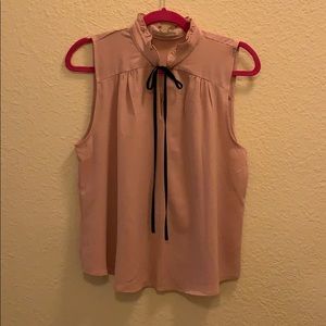 Blush sleeveless blouse